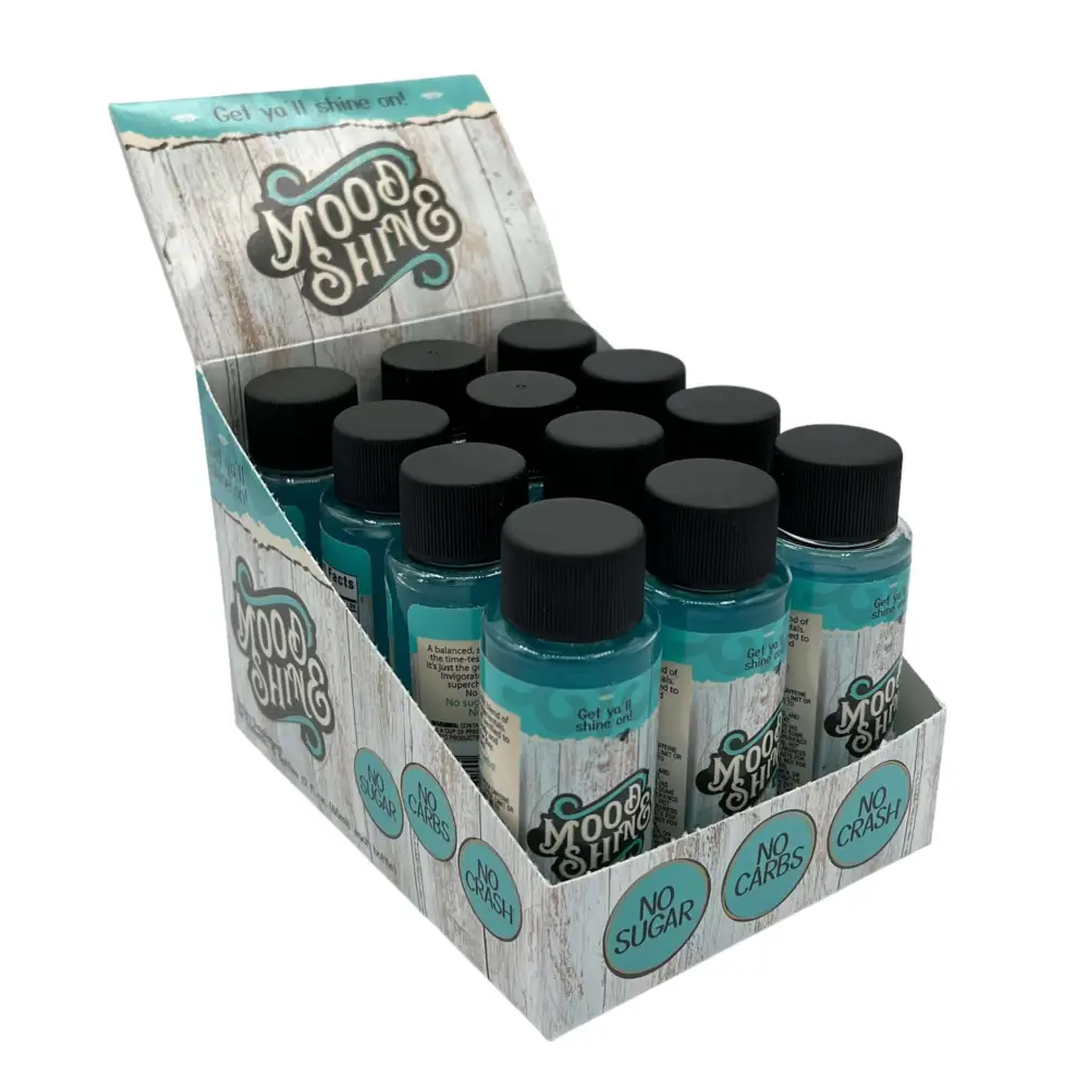 Display of Mood & Shine 2oz shots in a box, labeled 'No Sugar, No Carbs, No Crash' for daily energy boost.