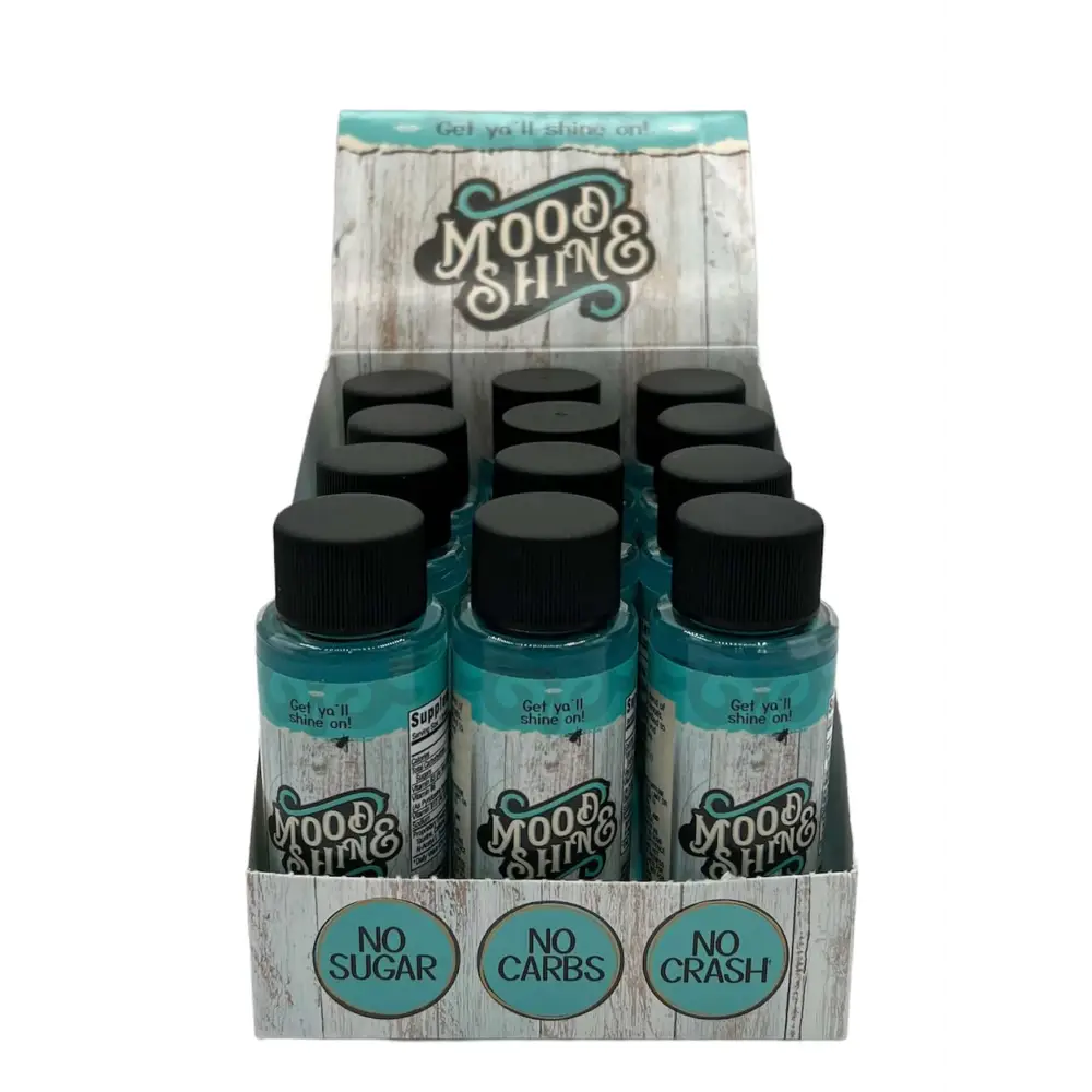 Mood & Shine 2oz shots displayed in a box, featuring labels 'No Sugar', 'No Carbs', and 'No Crash' for energy boost.