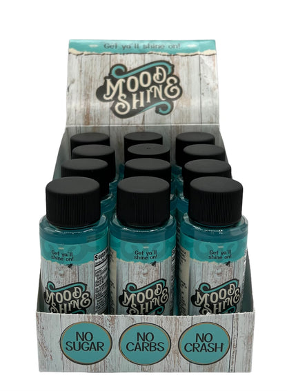 Display of Mood & Shine 2oz shots in a box, featuring no sugar, no carbs, and no crash for an energizing boost.