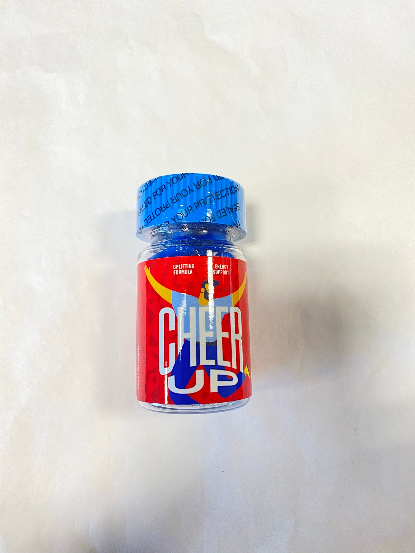 Cheer Up mood enhancer capsules bottle featuring bright red and blue design, optimized for focus and well-being.